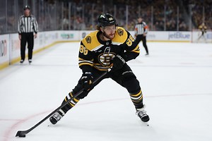 Which unique feat did David Pastrnak achieve after scoring his 60th goal of season?