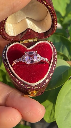 44 reactions | POV: A Padparadscha born at the meeting of sun and sea. Its princess cut glows with quiet fire, like a secret only the heart can understand. #padparadscha #promisering #jewelry #uniqueengagementrings #unboxing | Lovedenjewelry | Facebook