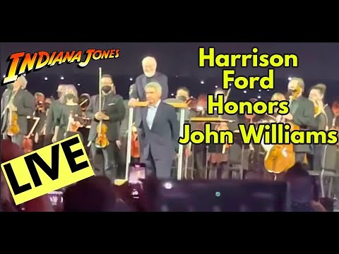 John Williams plays Indiana Jones theme live, Harrison Ford walks on stage.