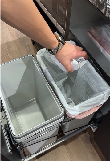 Exploring a Pull-Out Trash Cabinet in the Kitchen