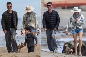 Simon Cowell walks dogs at beach with Lauren and son amid coronavirus pandemic
