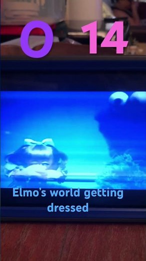 O 14 Elmo’s world getting dressed