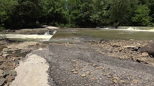 Natural Dam bridge washed out, stranding residents