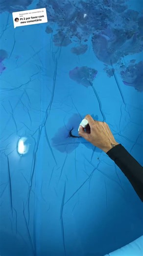 Testing watercolor experiment in pool water to make different design