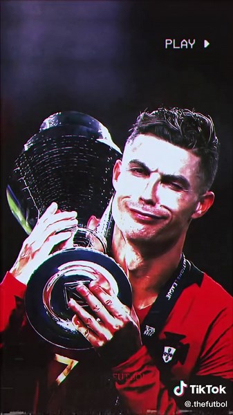 Ronaldo Celebrates Championship Victory with Trophy