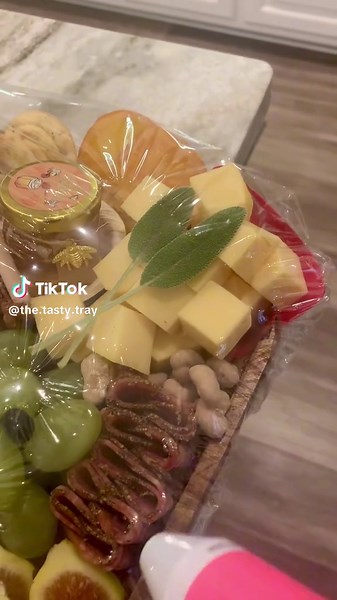 Just introduced my boards to shrink wrap. Where have I been?! #gamechanger #shrinkwrap #charcuterieboard #thetastytray #thetastytrayboards #asmr