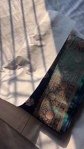 An uncommon and striking colour that transforms beautifully under light, revealing rich peacock blue tones. Adorned with intricate Meenakari and elegant silver zari highlights with subtle onion-pink accents, this saree is crafted exclusively for parties and statement occasions. Truly unique, bold, and unforgettable For order 91 8545818338 USP - Points): • Exclusive peacock blue dual-shade colour with luminous light reflection • Rare and uncommon shade, perfect for standout party looks • Fine Mee