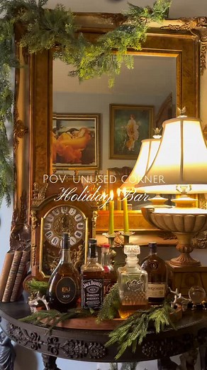 When I host a holiday party, I like to encourage guests to wander by placing food and drinks in different room. This little setup might surprise you, it’s actually a corner of my study. I’m loving the subtle speakeasy vibe. #holidayentertaining #christmasiscoming #quietluxury #holidayelegance #ralphlaurenhome #romancingmyhome #oldworldcharm #romantichomes | romancingmyhome