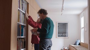 4.1K views · 13 reactions | The custom millwork partition merges two New York apartments while creating space for storage, a record player, and afternoon tea: https://www.dwell.com/article/a-multifunctional-storage-wall-solves-a-tricky-spatial-situation-8e4b04d9 | Dwell | Facebook