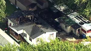 Firefighter suffers electrical shock while battling mobile home fire in Dayton