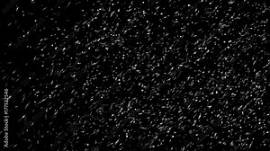 Snow falling background. Background of snow fall blowing fast in night winter blizzard. 4K