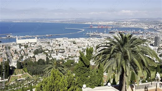 Haifa, Israel, April 3, 2026. Scenic panorama from Louis Promenade featuring the Bahá’í Gardens and Shrine of the Báb, landscaped terraces, the historic German Colony at the foot of the hill, and the