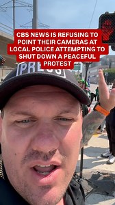 652K views · 10K reactions | @cbsnews was refusing to show local police in Los Angeles, attempting to shut down a peaceful protest outside of the federal building. A professor asked them if they were owned by Paramount and their response with a smile was yes. This is why independent journalism and media is so important because you really cannot trust mainstream media. Well at least not all mainstream media. This was an example of the reason why. | Jerrod Zisser | Facebook