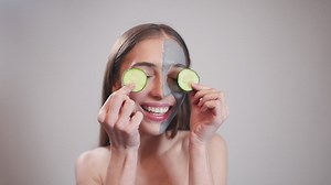 Portrait of a smiling woman with skin mask - Free Stock Video