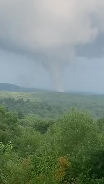 JUST IN: The National Weather Service confirmed that a weak tornado touched down in Litchfield County on Thursday. Watch the cloud funnel, captured by a Connecticut resident: https://bit.ly/3SbMI2N | WTNH News 8