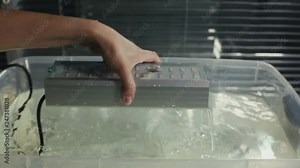 Testing of led street lighting lamp in water with full immersion