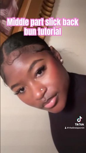 Middle part slick back bun tutorial on natural hair