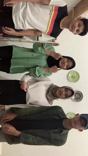 Coordinated Hand-Clapping Routine by Four Friends