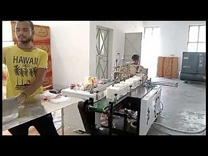 AUTOMATIC PAPER NAPKIN MACHINE WITH PAPER NAPKIN PACKING AND SEALING MACHINE