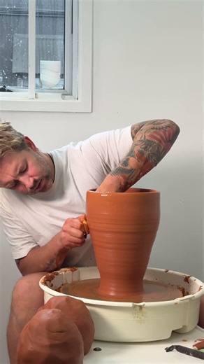 Wheel thrown organic vase using sand clay