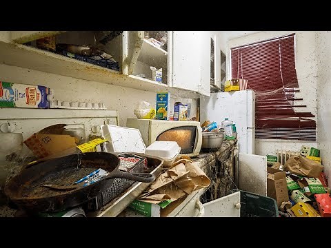 Abandoned Apartment Building With Power and a Filthy Hoarder Unit Inside!!