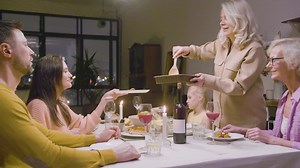 Free stock video - Family sitting at the table during dinner at home 2