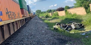 1 sent to hospital after car and train collide