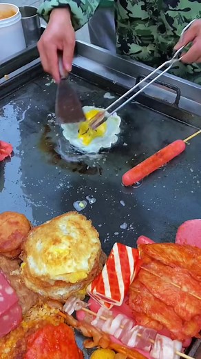 Street Food Preparation: Cooking on a Griddle