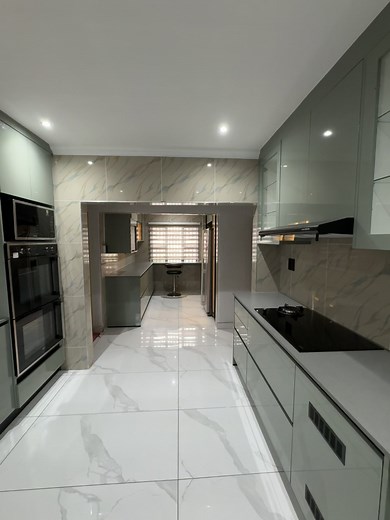 Sleek Modern Kitchen Design with Grey Cabinetry