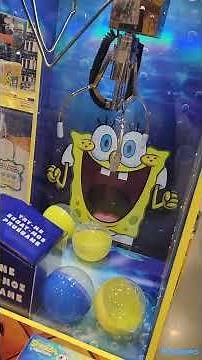 Playing with Arcade1Up SpongeBob Claw Machine Display at Costco