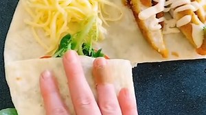 Clever cook's method for cutting, folding, and toasting wraps will better you