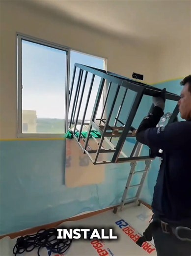 AC installation using a suspended basket outside a window