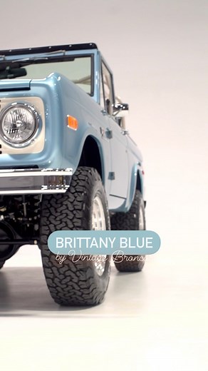 Vintage (formerly @vintagebroncos) on Instagram: "👀 What would you change on this Brittany Blue Vintage Bronco❓Wearing an original Ford paint color from the 1960’s with Wimbledon White grille + matching sport cage, Ball Glove Brown leather + contrast diamond stitching, chrome trim, polished classic wheels, 33” tires, wood steering wheel 😍 message us to learn more about this Bronco restomod with modern creature comforts, new car fit and finish, brand new drivetrain, bumper to bumper warranty 📨