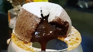 1.4M views · 13K reactions | This molten lava cake is a balancing act | Insider Food | Facebook