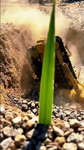 Powerful Bulldozer Action: Moving Mountains of Gravel! 🚧