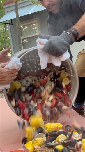 Who loves a good seafood boil? This was so incredibly good. Watching Live Fire Republic put on a show with Blue Rhino fueling the fire. Such an awesome event at Operation BBQ Relief. #campobr #lflbr23 #seafood #seafoodboil #hookedonbbq | Hooked on BBQ