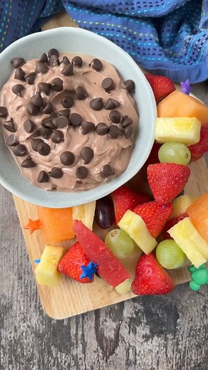 This chocolate fruit dip recipe will satisfy your sweet tooth and also give you a protein boost too. A mixture of 1cup (240g) Greek yogurt, 2 tbsp cacao, 1 tsp vanilla and 2 tbsp maple syrup (and optional refined sugar free chocolate chips), it's the perfect dip for fruit skewers and to encourage kids to eat more fruit. You could also just eat this Greek yogurt fruit dip with a spoon! | Hungry Healthy Happy - Easy Recipes