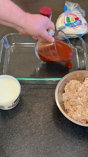 Perfect Chicken Enchiladas~Low Carb/Keto Click here for recipe ⬇️ #Chicken #EasyDinner #danospartner #newyearnewyou Boil 2 Ibs of chicken breast for 18 minutes, let cool, then shred with a mixer in a in a deep mixing bowl; while adding 1/4 cup of enchilada sauce. In a 9 by 13 pan, spread a 1/4 cup of enchilada sauce. Using a zero carb tortilla, spread 2 tbsp of queso dip on, then roll with 2 oz of shredded chicken. Place 12 to 14 enchiladas in to the pan. Spread 11/4 cups of enchilada sauce on t