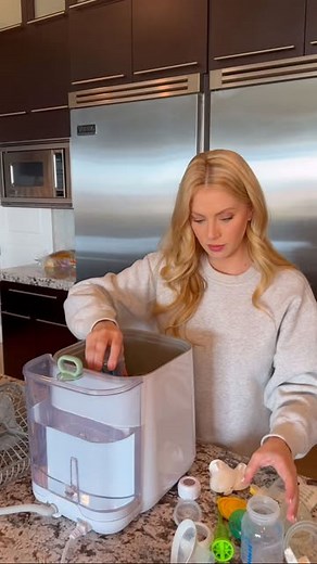 Emily Karlsson on Instagram: "I’m officially done washing bottles thanks to the @momcozy Pro Baby Bottle Washer and Sterilizer! It fits all my bottles and pump parts, thoroughly cleaning and sterilizing everything in just one wash cycle. I was amazed at how efficiently it works! Now, I have so much more time for chasing my toddler and snuggling my baby. I also love their bottle warmer—perfect for travel and on-the-go feedings! Check out Momcozy products today! #momcozy#momcozybottlewasher#bottle