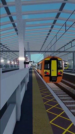 Class 387 double passing Morganstown at speed