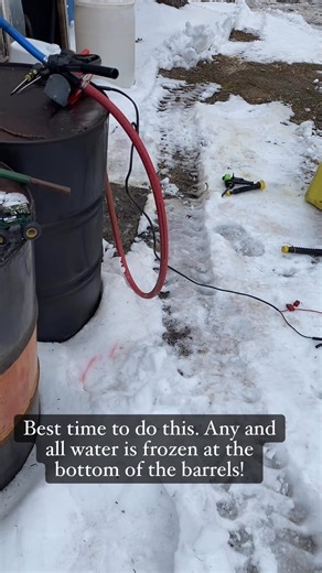 Filling cans with heating oil. I use a fill rite pump and a 20v dewalt lithium battery to power it. Don’t love the blue silicone hose, it gets hard and brittle in the extreme cold temps. | David Syfert