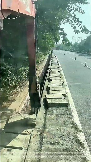 The Gutter's New Lid: Precision Placement of Concrete Slabs with a Machine Claw