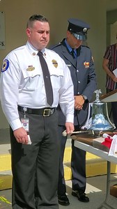 Venice Fire Department EMS Division Chief Nathan McManus rings the bell for the fallen on Sept. 11, 2001, during today's 9/11 Ceremony | Venice, Florida Municipal Government