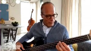 Lester Holt jams on bass guitar for Kelly Clarkson