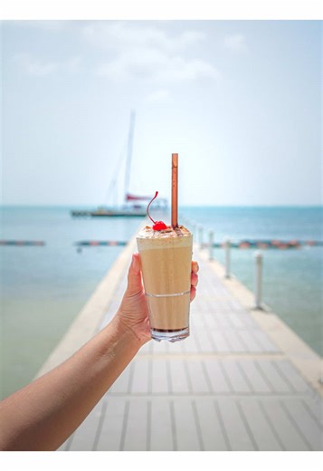 🍫Vodka? Kahlúa? A blender and a brilliant idea? Watch as the owner of Rum Point spills the (chocolate) tea on how the iconic Mudslide was born-right here on our beach. It’s not just a drink, it’s a Cayman classic. 🇰🇾 #caymanislands #rumpoint