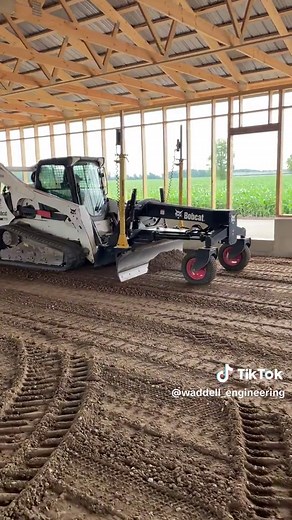 Bobcat Skid-Steer Loader in Action on Agricultural Site