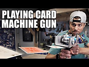 Can a Playing Card Machine Gun Beat the World's Best Card Thrower?