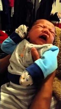 Baby Logan crying for his bottle