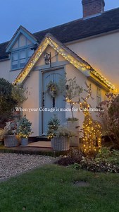 Welcome to our English Country Cottage at Christmas Time ✨🎄 It really comes into its own this time of the year! Fire roaring & Lights twinkling. The Aga in the kitchen is ready to bake some festive treats 🫶🏼 Ad. Did you notice the cute light up Christmas trees by the front door from @lights4fun ✨ #christmascottage #cottageaesthetic #bootroom Entrance hall | mudroom entrance | Aga | beams | country cottage | dining room | cottage kitchen | cottage porch | Christmas bedroom | Chanel Barber