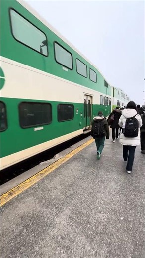 GO 247 pushing out of Aurora GO and leading a GO train while being pushed by an F59PH